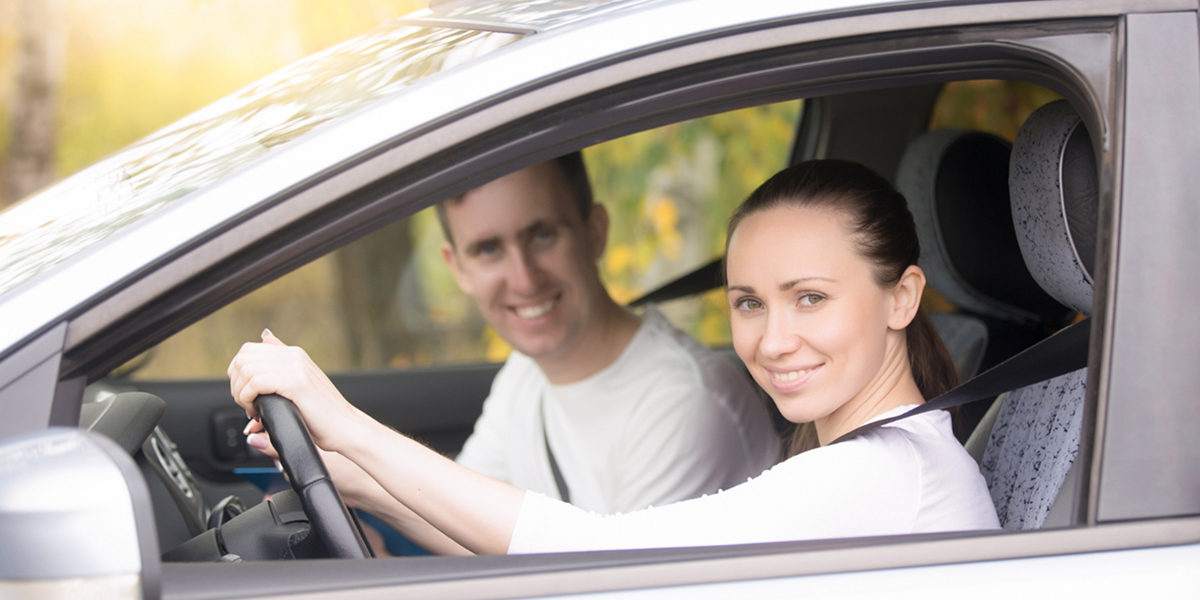 Professional driving instructor teaching learner driver on Melbourne road